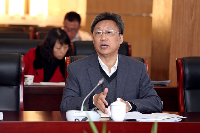 校党委副书记周小浦传达会议精神