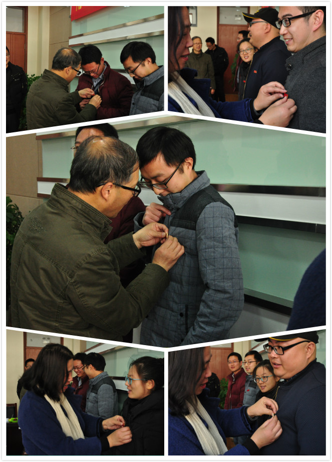 老教师为新教师佩戴校徽